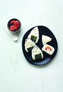 Rice balls with salmon and umeboshi, from The Gluten-Free Cookbook. All photography by Infraordinario Studio