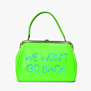 Michele Pred, We Won’t Go Back, 2022. Vintage purse with electroluminescent wire. 12 × 11 × 4 in. (30.5 × 27.9 × 10.2 cm). Artwork © and courtesy the artist / courtesy Nancy Hoffman Gallery.