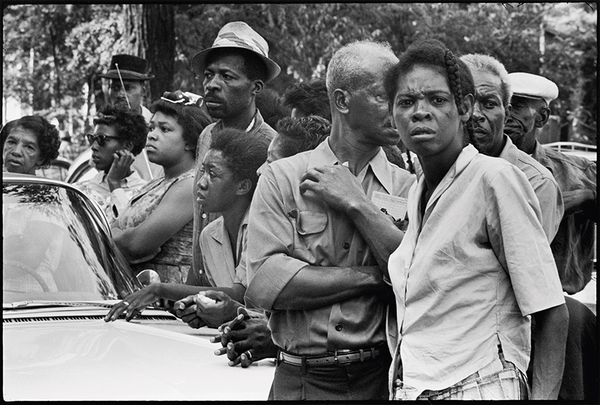 Crowds along the funeral route of the four girls murdered in the bombing of the 16th Street Baptist church, Birmingham, Alabama, September 1963 / Student Non-violent Coordinating Committee (SNCC), 1964–62.
All photographs by Danny Lyon, from The Seventh Dog