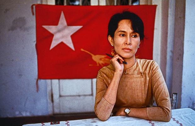 Steve McCurry, 'Aung San Suu Kyi and the flag' (1996), Rangoon, Burma