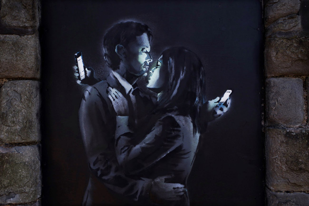 Detail from Banksy's Mobile Lovers (2014)