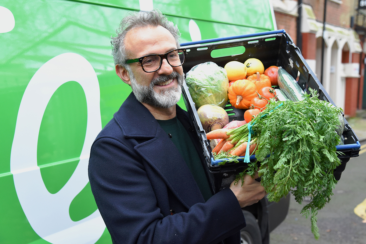Massimo Bottura helping with ingredients for Refettorio Felix in London