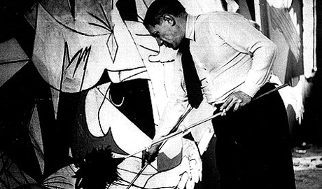 Picasso painting Guernica (1937)